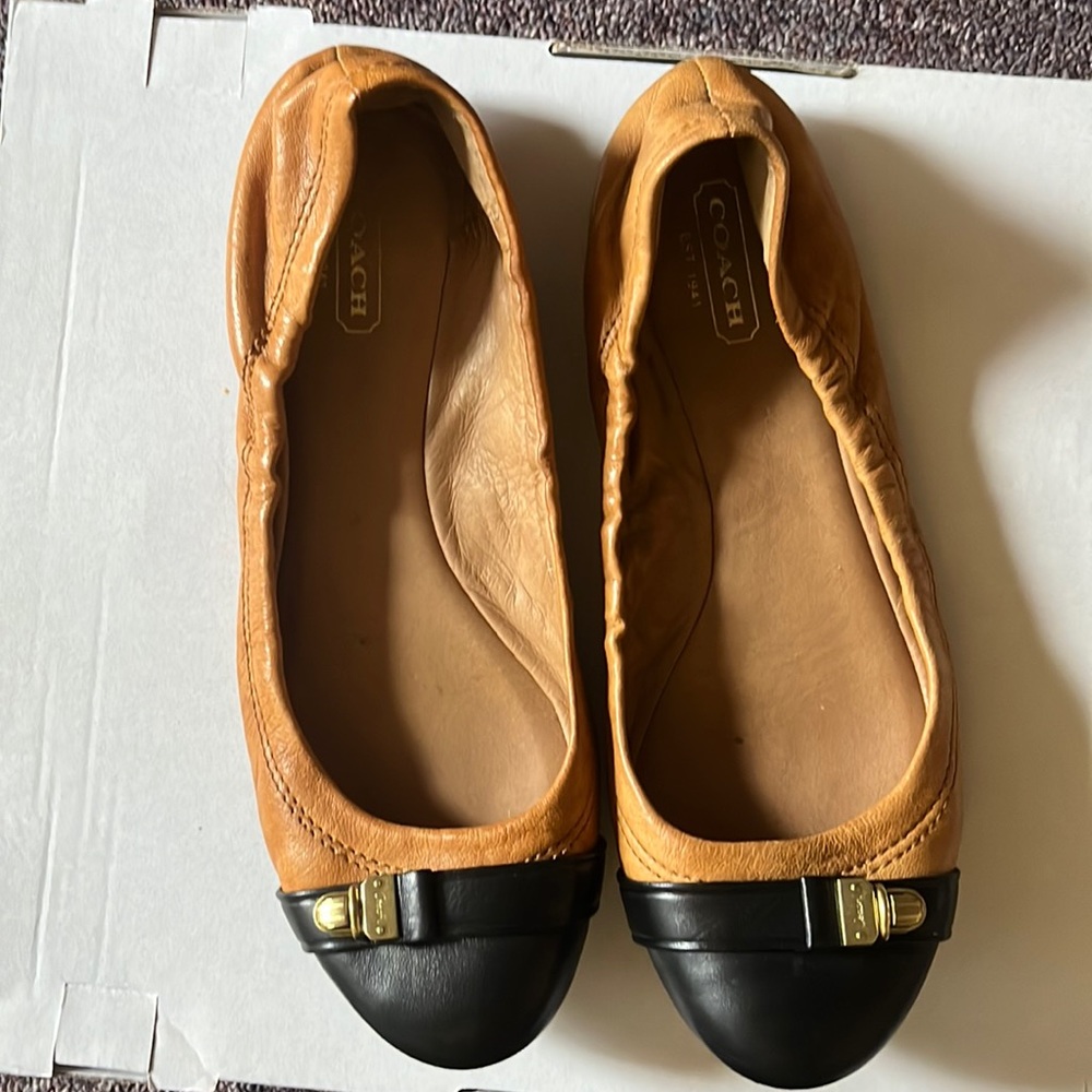 Tan and black COACH flats with cute buckle size 7